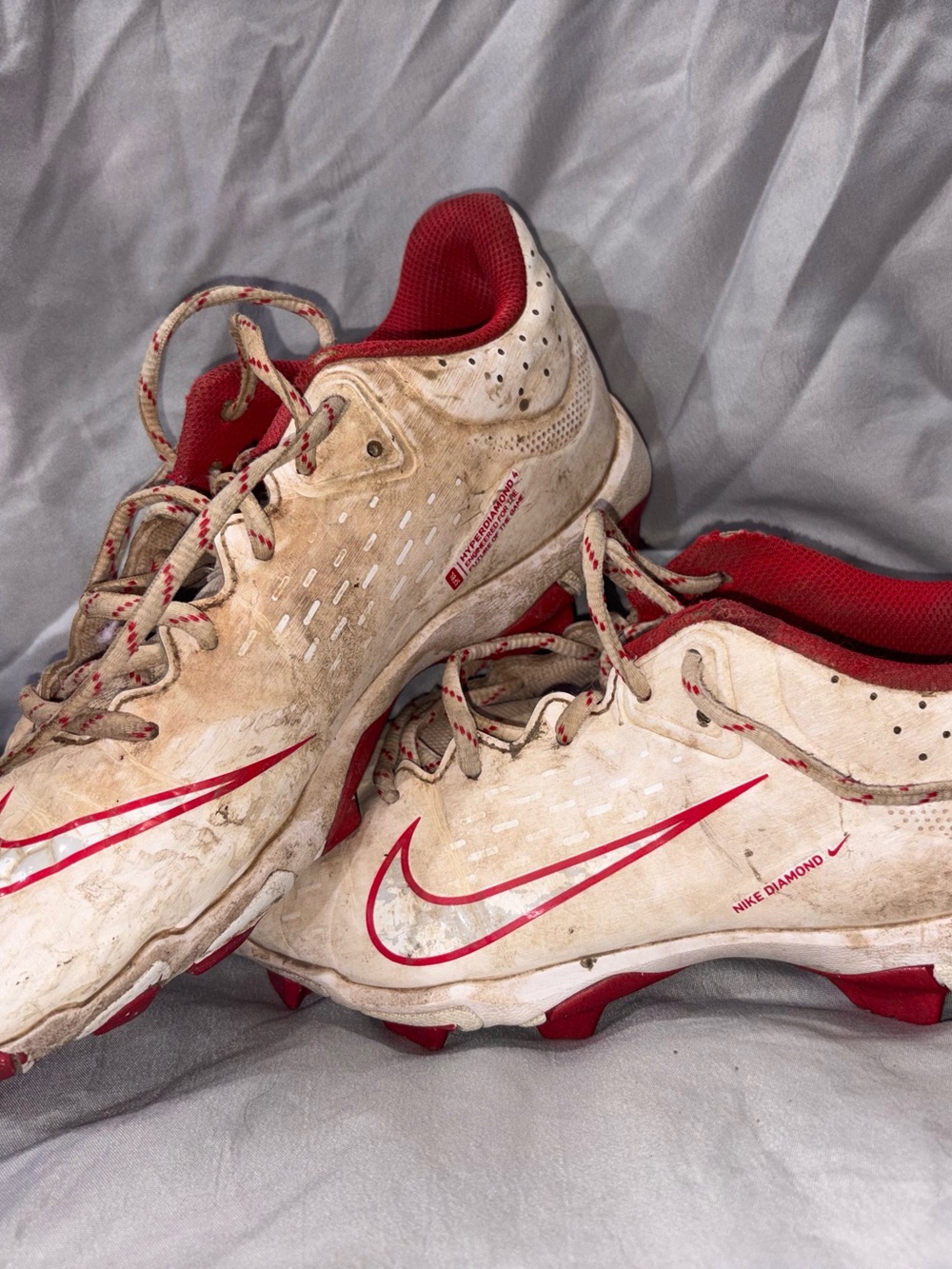 Nike women’s White and Red Cleats